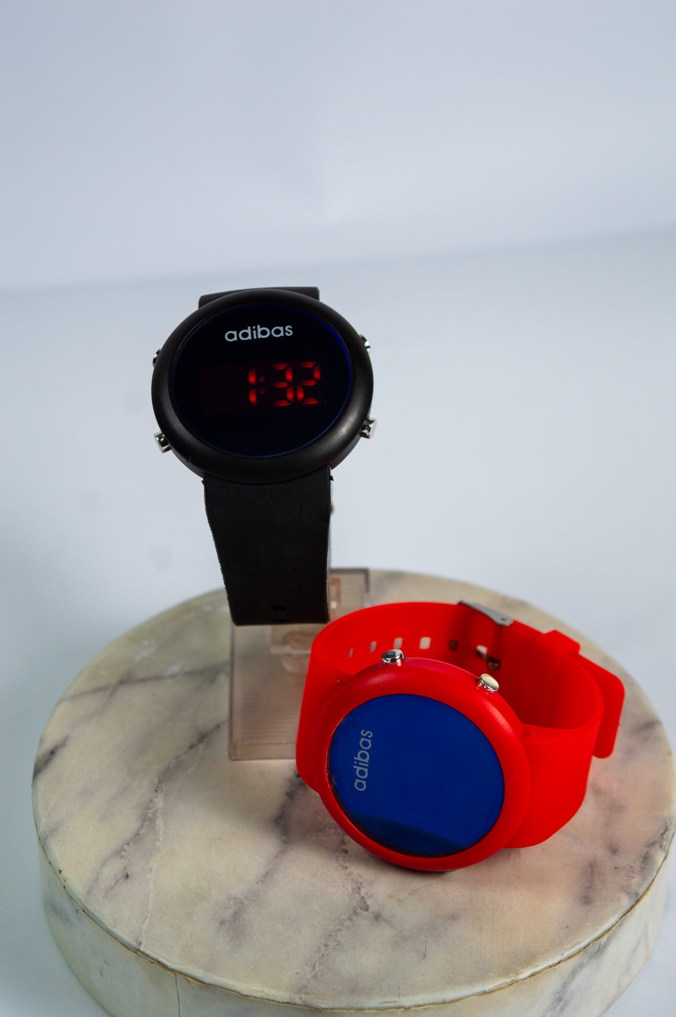 Wrist watch available in red & black Colors with random theme lights
